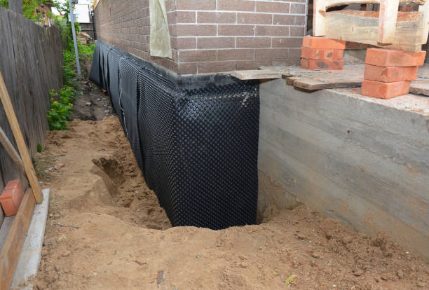 SJ Waterproofing Pros technician performing targeted Waterproofing assessment in Mowrystown, OH